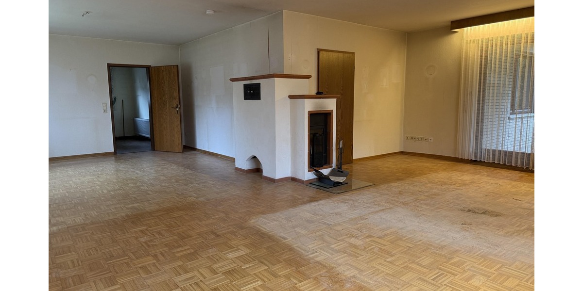 Wohn- und Esszimmer mit Kamin